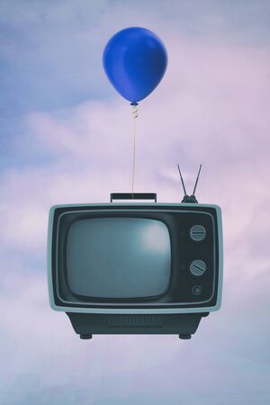 An old analogue television and a balloon in the sky, graphic resourceの写真素材