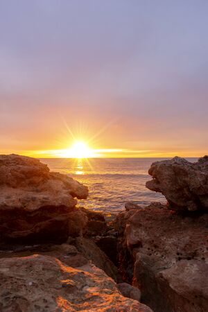 A beautiful sunrise in Oropesa, Costa Azahar, Spainの写真素材