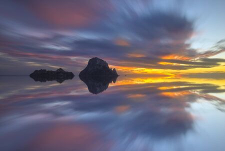 The island of Es Vedra from Ibiza at sunset, Spainの写真素材