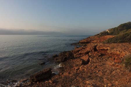 The coast of the renega at dawn in Oropesa, Spainの写真素材