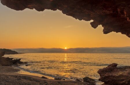 The coast of Oropesa from the sea at sunrise, Spainの写真素材