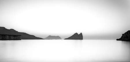 A calm sunrise in black and white, Aguilas, Spainの写真素材