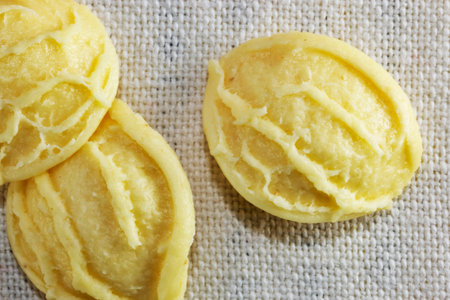 Orecchiette pasta on a white cloth ,a small ear shape pasta with the center thinner than the edge ...