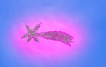 Shooting star studio shot with bright glitters , pink-blue background