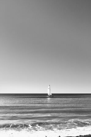 Beautiful sailboat in full sail on the Mediterranean sea ,black and white photographyの写真素材