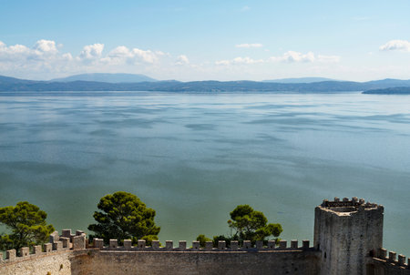 Trasimeno lake with the fortress of the Lion