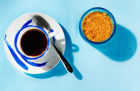Coffee cup and brown sugar