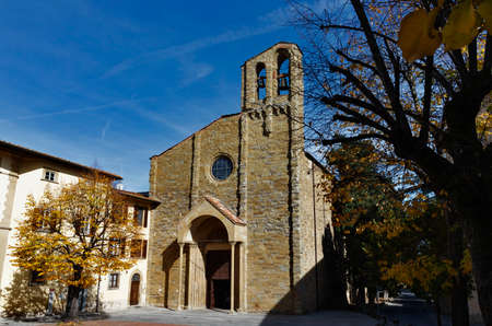 Church of San Domenico in Arezzo - Tuscany - Italy, unfinished medieval facade with small bell towerの写真素材
