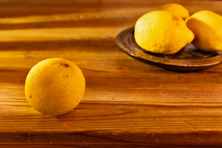 Fresh lemons on the table, healthy eatingの写真素材