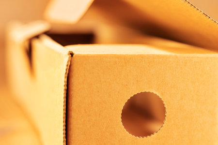 Small empty brown cardboard box, open packageの写真素材