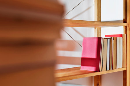 Books on wooden shelves, self study, reading lifestyle or back to schoolの写真素材
