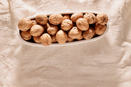 Fruit of walnuts in white box, healthy eating, nutritional supplement