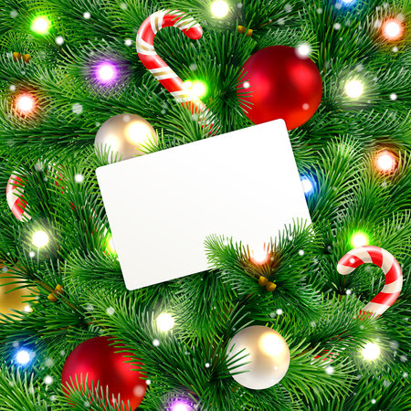 Christmas background with decorated spruce branches and an empty greeting cardのイラスト素材