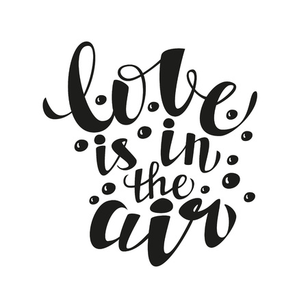 Hand lettering calligraphic typography poster.Romantic quote 'Love is in the air'.For greeting cards, postcards, posters, t-shirts and other decorations.Vector illustrationのイラスト素材