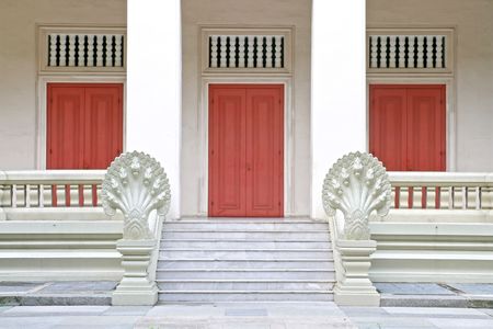 Traditional Thai Chinese style of Wooden door with Marble Step and Stone Carving in Naga Styleの写真素材