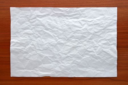 Wrinkled White paper attach on Wooden Boardの写真素材