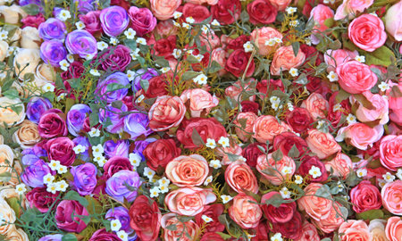 Heap of Fake rose flower using as love and beauty conceptual background