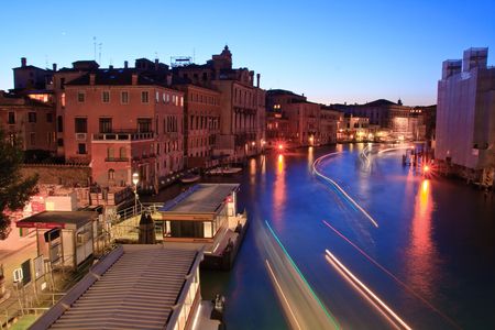 Light Trail of Passenger ship at Grand canal from Accademia bridge at dusk,Venice Italyの写真素材