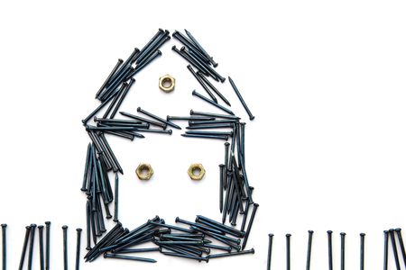 Conceptual of blue steel nail construct house with windows and fenceの写真素材