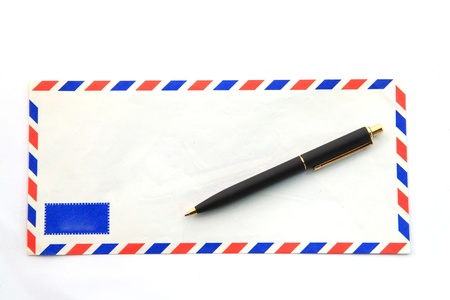 isolated air mail envelope with penの写真素材