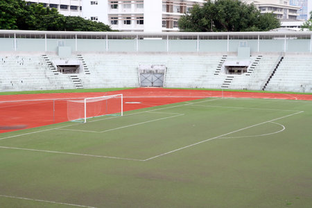 soccer football goal with penalty area on fake grass pitchの写真素材