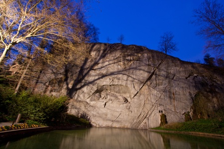 dying lion monument in Lucern Switzerland twilightの写真素材