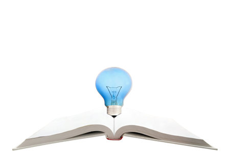 blank magic book with reading light bulbの写真素材