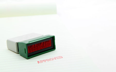 approved stamp on paper with stamp