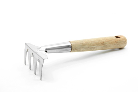 gardening fork trowel lute isolated on whiteの写真素材