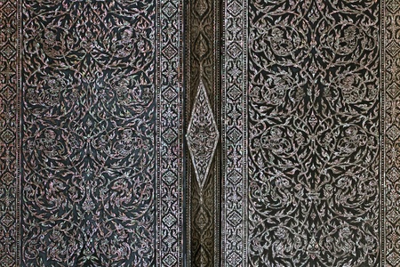 Beautiful Decorate luxury door at Wat Phra Keao, Grand Palace Bangkok Thailandの写真素材
