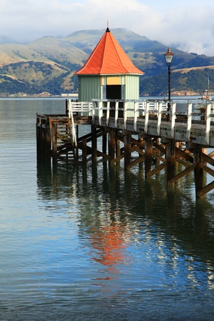 jetty pier building on lake at Akaroa New Zealandのeditorial素材