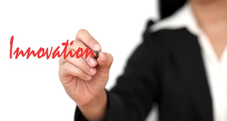 asian business woman hand writing Innovation wordの写真素材