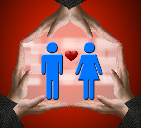 Hands showing Home sign with Male and Female in love using for Sweet home conceptualの写真素材