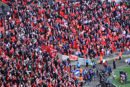 LONDON - APRIL 14 : Supporters watch the football game of Liverpool - Everton Semi Final FA Cup Crowd at Wembley Arena Stadium on April 14, 2012 in London, England United Kingdom.のeditorial素材