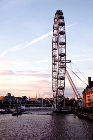 LONDON - April 14: London Eye from Westminster bridge, on April 14, 2012 in London. The largest Ferris wheel in Europe, structure of the London Eye is 135 M. tall and the wheel has a diameter of 120 M.のeditorial素材