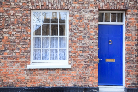 Windows and door on Gothic style Brick houseの写真素材