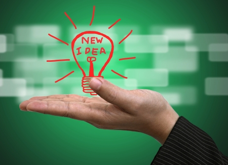 Light bulb on Business hand for New Idea Innovation Conceptの写真素材