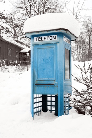 Blue Telephone Booth with snow in Stockholm Swedenの写真素材