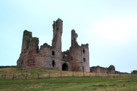 Ruin of Dunstanburgh castle Northumberland ULのeditorial素材
