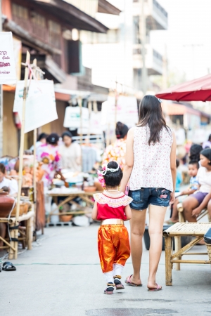 SUKHOTHAI, THAILAND - MAY 4 : Unidentified tourists are shopping at Rim Yom 2437  market on May 4, 2013 in Sukhothai, Thailand.のeditorial素材
