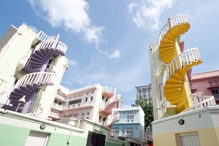 Colorful fire escape on facade of modern buildingの写真素材