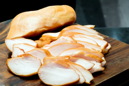 Whole pork ham and sliced hamの写真素材