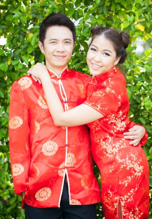 Happy Young Couple with chinese dress in loveの写真素材