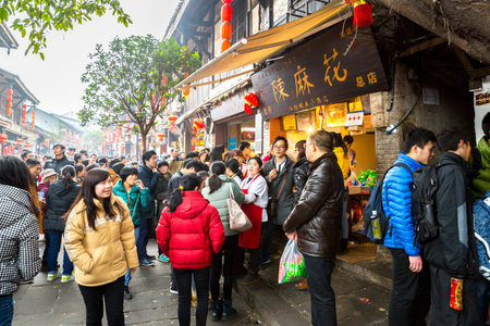 CHONGQING, CHINA - JAN 17: Unidentified tourists are shopping at Ciqikou Ancient Town on January  17, 2014 , Chongqing, China.のeditorial素材