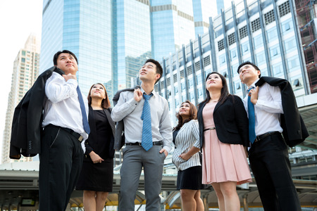 International business team over modern urban backgroundの写真素材