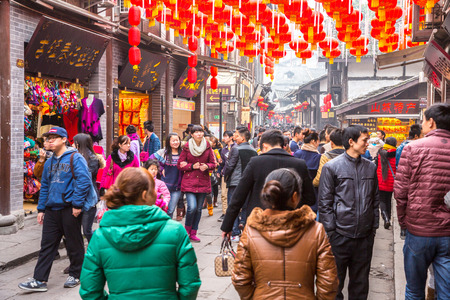 CHONGQING, CHINA - JAN 17: Unidentified tourists are shopping at Ciqikou Ancient Town on January  17, 2014 , Chongqing, China.のeditorial素材