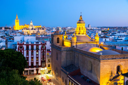 Seville Cathedral and cityscape downtown at dusk Sevilla, Spainの写真素材