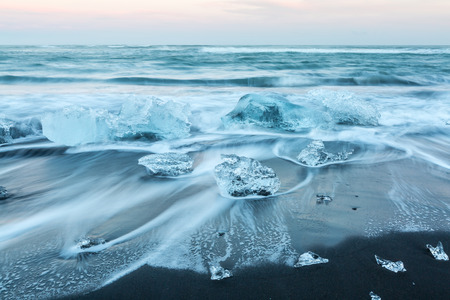 Iceberg beach at Jokulsarlon Iceland sunsetの写真素材