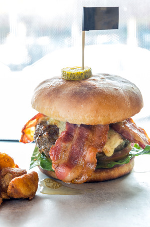 Angus beef Cheese hamburger with french friesの写真素材