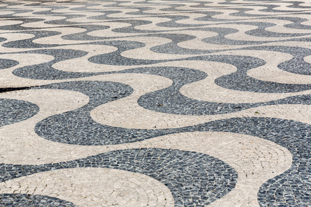 Tile brick floor in Lisbon Town Square, Portugal using as backgroundの写真素材